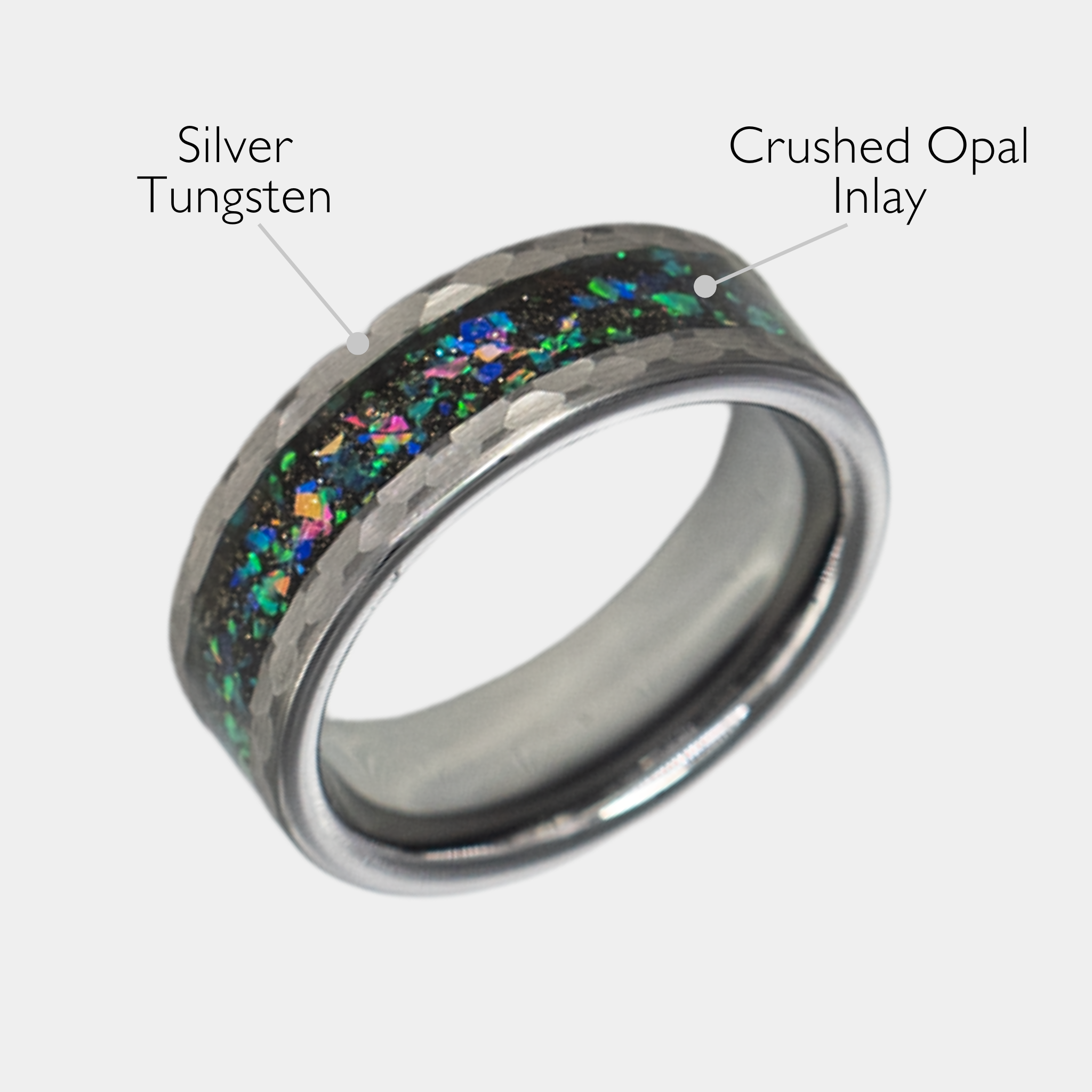 Typhon ring – Hammered Silver Tungsten featuring a Crushed Opal Inlay from the Hustler Collection. Angled view with product name overlay.